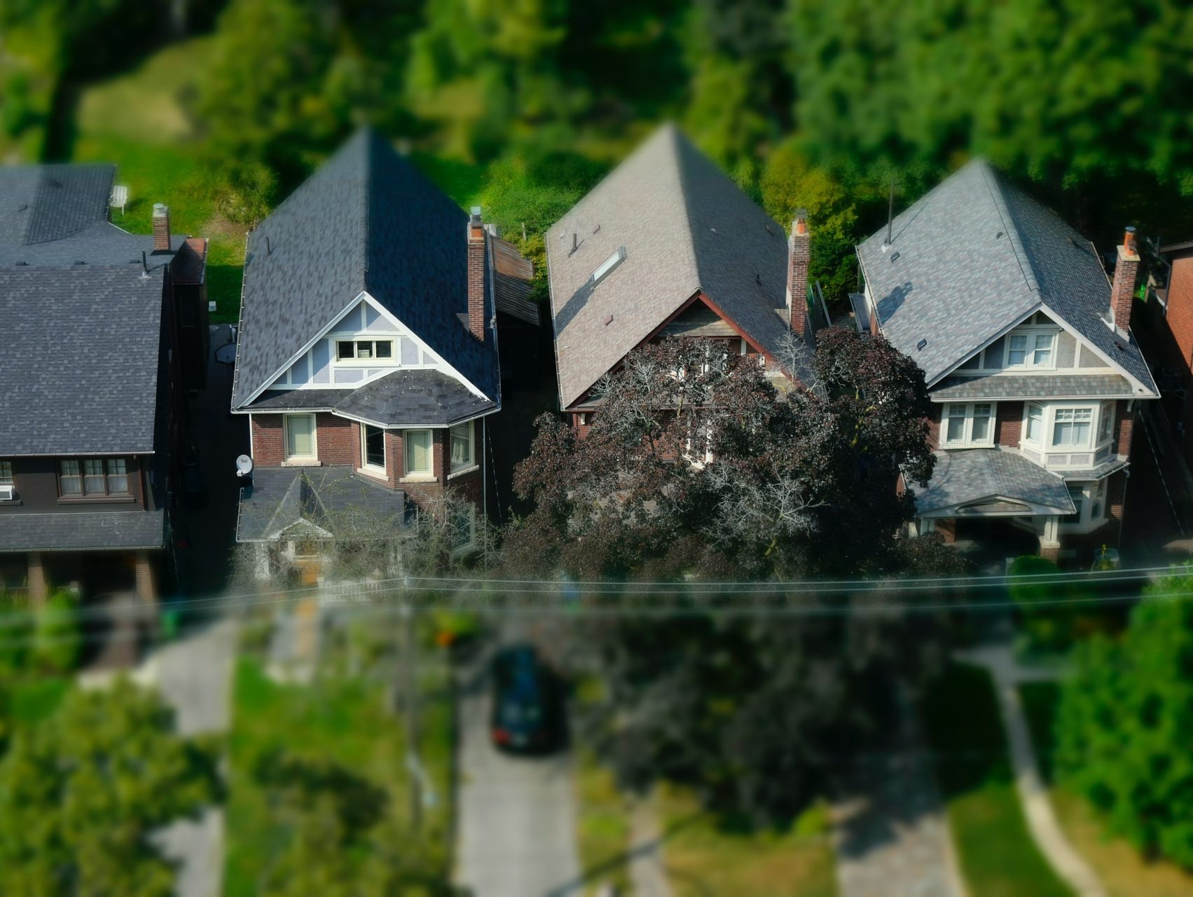 tilt-shift photography of house minitaure